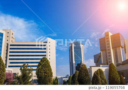 a complex of modern buildings on a sunny summer day 119055708