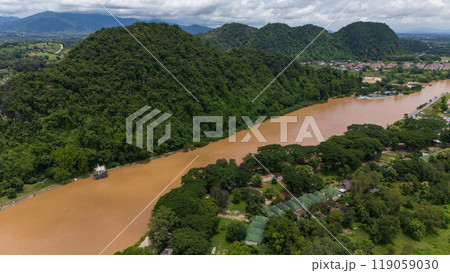 Aerial view of Mae Kok river rising during typhoon Yagi has swept Southeast Asia. This river is the blood line for people of Chiang Rai, started from the hills on boarder of Myanmar. Aerial view of Mae Kok river rising during typhoon Yagi has swept Southeast Asia. This river is the blood line for people of Chiang Rai, started from the hills on boarder of Myanmar. 119059030