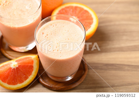 Orange yogurt smoothies in glass, Healthy fruit drink Orange yogurt smoothies in glass, Healthy fruit drink 119059312