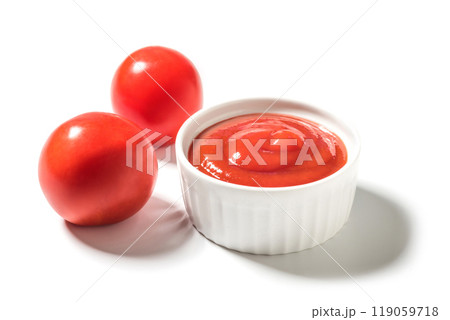 Ripe tomatoes and ketchup on white close up Ripe tomatoes and ketchup on white close up 119059718