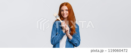 Creative pretty redhead female in denim shirt, creating new art, painting, making repair works in own room, holding paintbrush and smiling tempting, standing white background Creative pretty redhead female in denim shirt, creating new art, painting, making repair works in own room, holding paintbrush and smiling tempting, standing white background 119060472