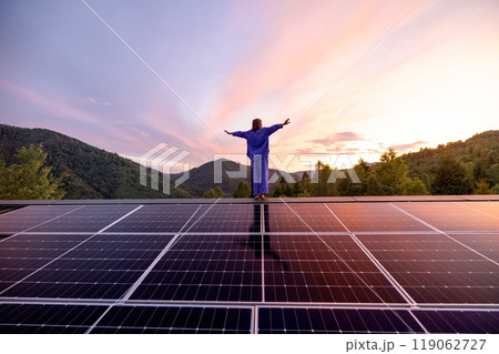 Rooftop with solar panels on house in mountains, 119062727