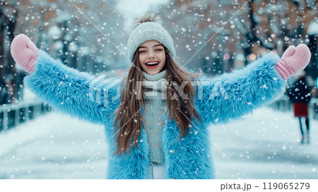 A school age happy girl outside on a cold winter day. Girl in blue faux fur coat laughing and frolicking outdoors. A cheerful happy child. Winter park This is AI-generated item 119065279
