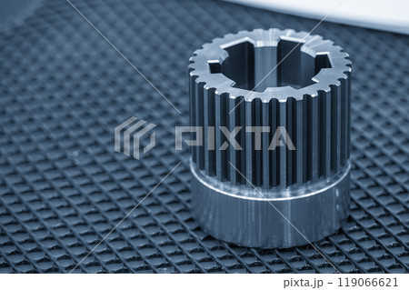 Close up scene the set of pinion gear parts in the light blue scene. Close up scene the set of pinion gear parts in the light blue scene. 119066621