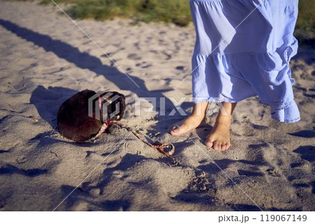 young plus size woman walking and playing with her pet rabbit by the sea in Copenhagen young plus size woman walking and playing with her pet rabbit by the sea in Copenhagen 119067149