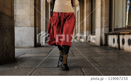 Woman In Red Skirt Walking In Autumn City 119067258