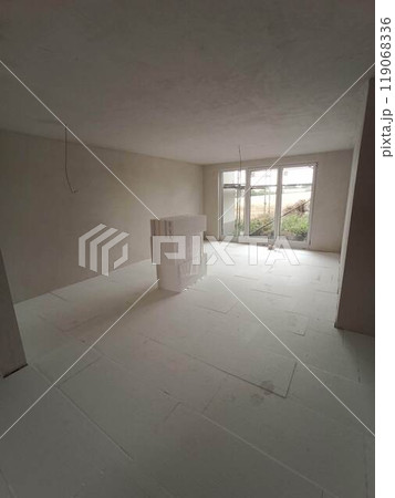 A Spacious Modern Living Area that features abundant Natural Light filling the space 119068336