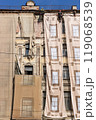 Repair work of the facade of an old building at an altitude 119068539