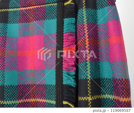 Colorful wool plaid pencil midi skirt on white background, 80s 90s vintage winter fashion trends Colorful wool plaid pencil midi skirt on white background, 80s 90s vintage winter fashion trends 119069587