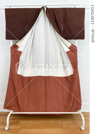Colorful kimono robe on a hanger, promo photo for an online women's clothing store Colorful kimono robe on a hanger, promo photo for an online women's clothing store 119070451