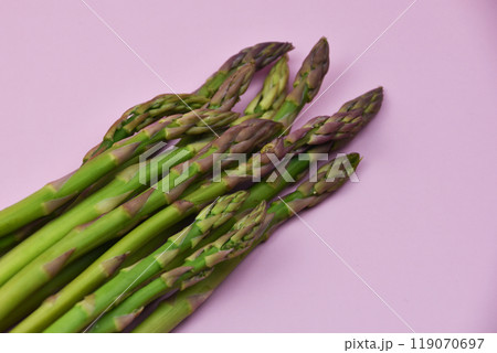 Asparagus on a pink background Asparagus on a pink background 119070697