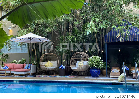 Garden furniture near the pool, patio interior 119071446