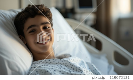 Middle Eastern Teenage Boy Recuperating in Hospital Double Bed, Smiling Serenely, Capturing Hope and Resilience in Medical Setting Middle Eastern Teenage Boy Recuperating in Hospital Double Bed, Smiling Serenely, Capturing Hope and Resilience in Medical Setting 119073121