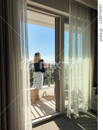 A woman  on the balcony 119075697