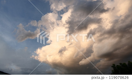 Dark rain cloud dramatic sky summer tropical thunder storm sky and fluffy black darkness cloud nearly raining cloudscape. Nimbus raincloud skyline climate background. Dark gray sky cloudy environment 119078626
