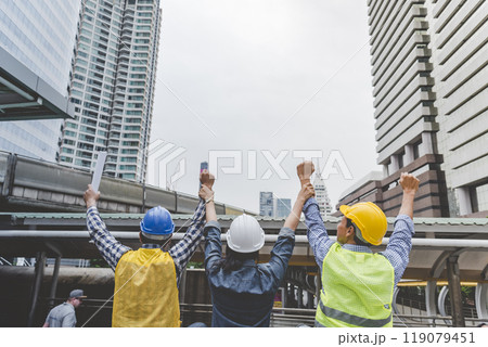 Group of multiracial people Teamwork meeting join hands Engineer Manager Foreman fist bump together. Close up diversity engineer people hands partner teams. Business connection team join partnership 119079451