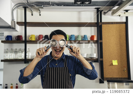 Portrait barista Asian man coffee shop owner smiling look at camera small business confident person Entrepreneur manager professional men standing coffee counter bar. Barista small business Owner Portrait barista Asian man coffee shop owner smiling look at camera small business confident person Entrepreneur manager professional men standing coffee counter bar. Barista small business Owner 119085372