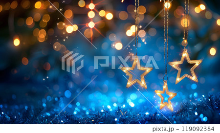 Christmas stars with light string hanging at fir branches for season greetings holiday. 119092384