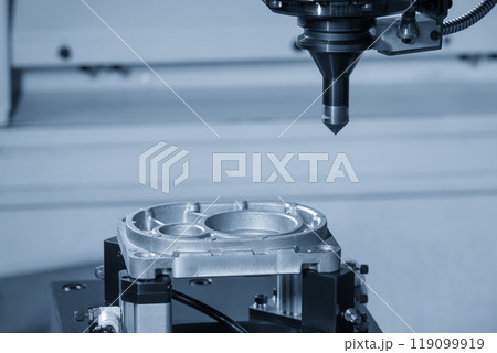 The CNC milling machine chamfer cutting aluminum part by chamfer tool in the light blue scene. The CNC milling machine chamfer cutting aluminum part by chamfer tool in the light blue scene. 119099919