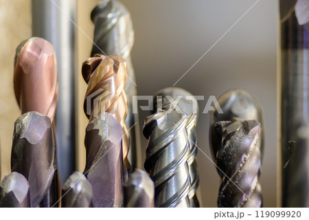 Close-up scene the group of used   cutter end mill tools. 119099920