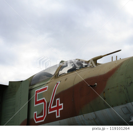 Plexiglas cabin of a military jet fighter with a directional antenna detailed stock photo Plexiglas cabin of a military jet fighter with a directional antenna detailed stock photo 119101264
