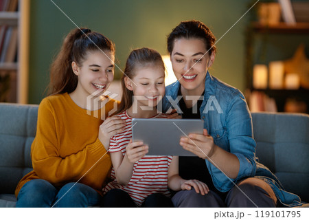 family using tablet pc together family using tablet pc together 119101795