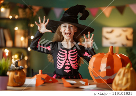 girl with polygonal paper pumpkin girl with polygonal paper pumpkin 119101923