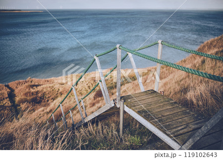 Stairs at cliff at Limfjord in Denmark 119102643