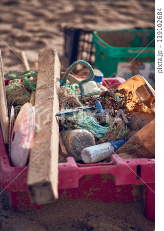 Trash littered at snd beach 119102684