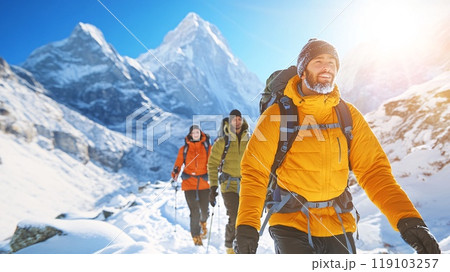 Friends of Different Backgrounds Enjoying a Winter Hike in the Mountains 119103257