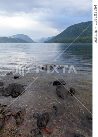 Siberian landscape with stones at the Teletskoye lake coast. Altai Republic, Russia 119103864