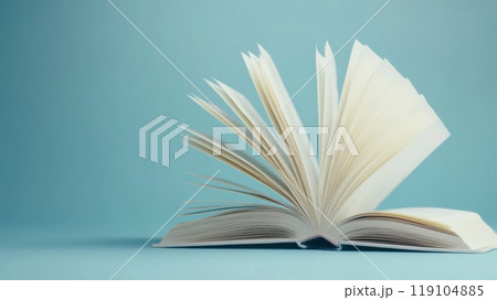 Open Book with Pages Turning Against a Soft Blue Background, AI 119104885
