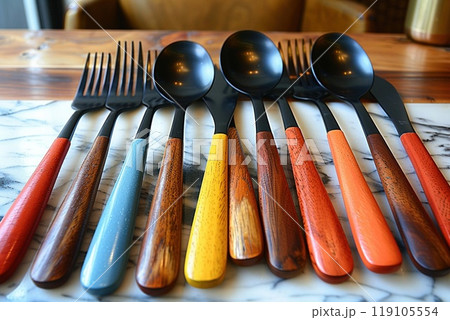 A colorful cutlery set with a modern design. 119105554