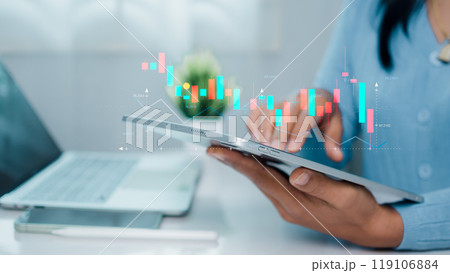 Businesswoman is showing a growing virtual hologram of analytics dashboard with charts, Stock market, Business growth, Progress or success concept, Invest in trading, Finance, Sales, Marketing. 119106884