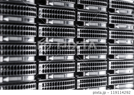 Cluster of data storage hard drives inside server room Cluster of data storage hard drives inside server room 119114292