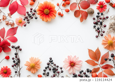 Autumn-themed frame with vibrant orange and red leaves, white and red flowers, berries, and dried branches on a white background. Autumn-themed frame with vibrant orange and red leaves, white and red flowers, berries, and dried branches on a white background. 119114424