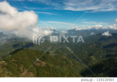 Aerial drone of mountain slopes covered with rainforest and jungle View from above. Philippines. 119116563