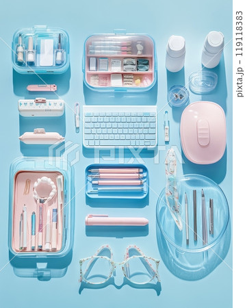 Neatly arranged workspace with pastel blue and pink accessories, featuring keyboard, mouse, pens, and organizational tools on light blue background Neatly arranged workspace with pastel blue and pink accessories, featuring keyboard, mouse, pens, and organizational tools on light blue background 119118383