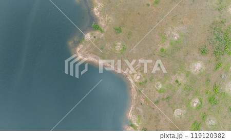 Drone shot. Aerial view scenic landscape of a large river delta amid a lush forest at the tropical Asia place 119120382