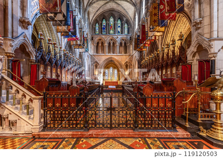 Gothic Chancel of St. Patrick's Cathedral with carved stalls vibrant stained glass windows Gothic Chancel of St. Patrick's Cathedral with carved stalls vibrant stained glass windows 119120503