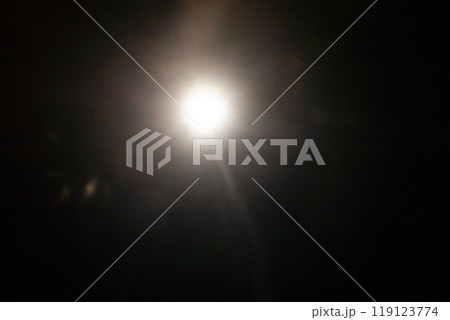 Sun flare on the black background Sun flare on the black background 119123774