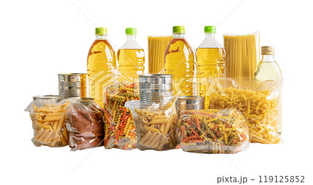 Foodstuff for donation, storage and delivery. Various food, pasta, cooking oil and canned food in cardboard box. Foodstuff for donation, storage and delivery. Various food, pasta, cooking oil and canned food in cardboard box. 119125852