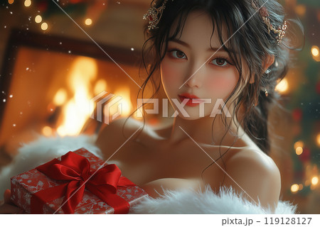 サンタコスチュームを着てクリスマスプレゼントを贈る日本女性 119128127