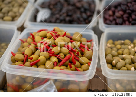 Olives displayed on a farmer's market counter Olives displayed on a farmer's market counter 119128899