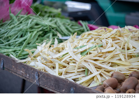 Fresh vegetables displayed on a farmer's market counter 119128934