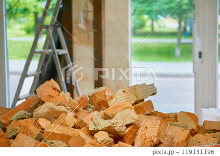 Broken garbage.A pile of red brick fragments.Cleaning repairs 119131196