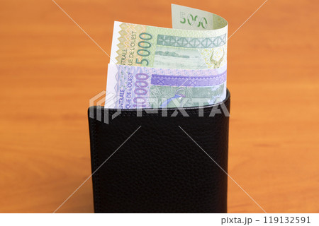 Central African franc in the black wallet 119132591