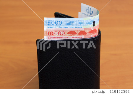 CFP franc in the black wallet 119132592