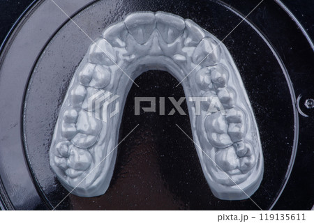 Transparent plastic night mouth guard for teeth clenching. Remedy for grinding teeth, oral care. Transparent plastic night mouth guard for teeth clenching. Remedy for grinding teeth, oral care. 119135611