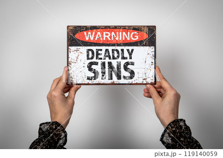 Deadly Sins. Warning sign with text on a white background Deadly Sins. Warning sign with text on a white background 119140059